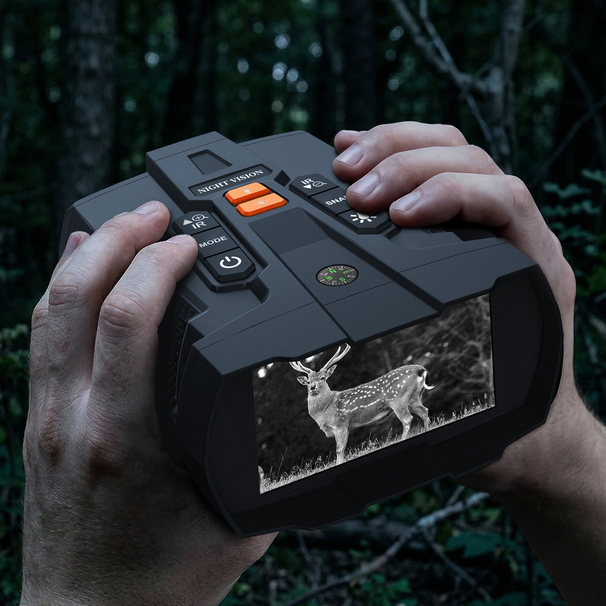 POV hands holding Minener NOX-V5 premium 4K night vision goggles. The 4.5-inch screen shows a clear deer in a dark forest for wildlife observation.